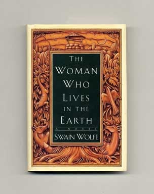 Book #18301 The Woman Who Lives in the Earth - 1st Edition/1st Printing. Swain Wolfe