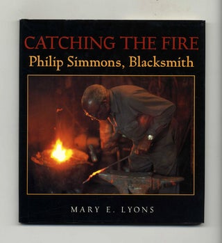 Book #29596 Catching The Fire: Philip Simmons, Blacksmith - 1st Edition/1st Printing. Mary E. Lyons